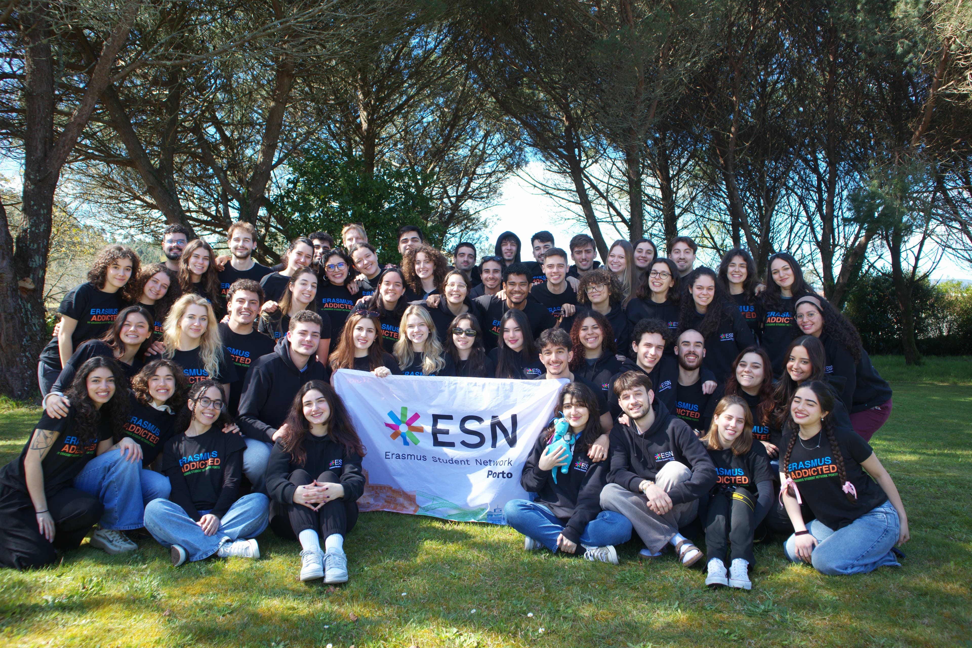 The ESN Porto volunteer team holding the ESN flag